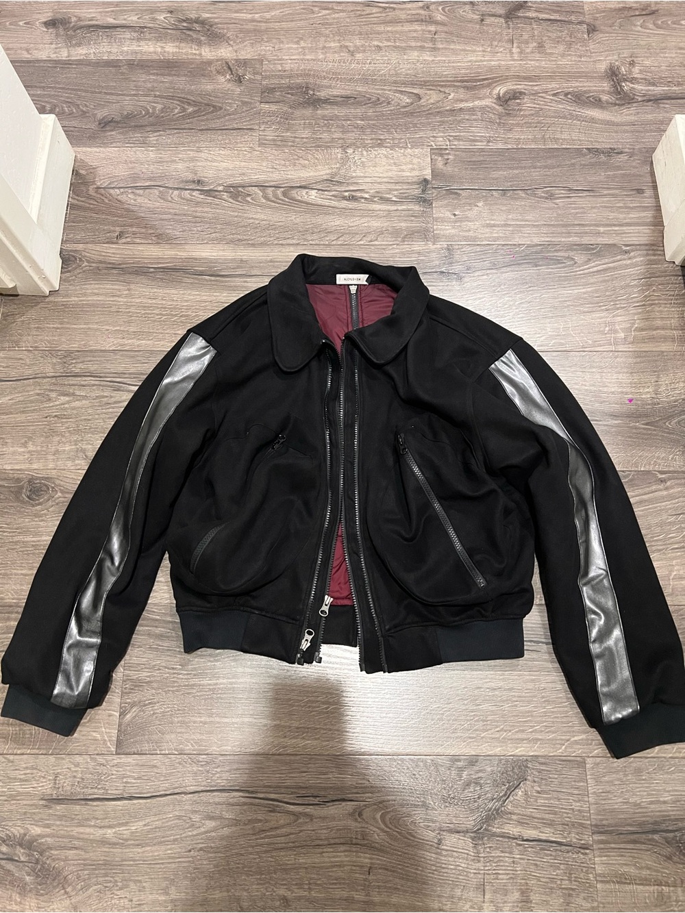 Black Bomber Jacket with Metallic Sleeve Stripes
